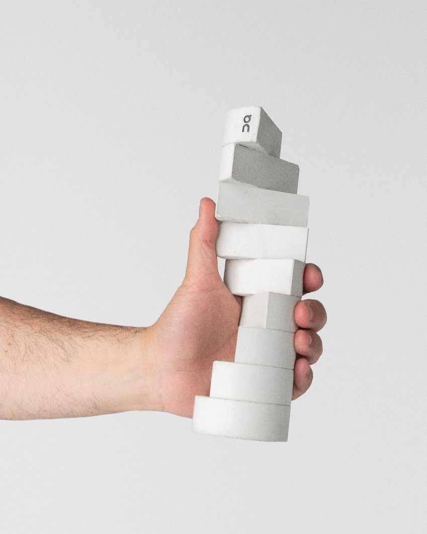 On Squad Race World Series 2026 trophy in concrete with recycled rubber, stacked modular form