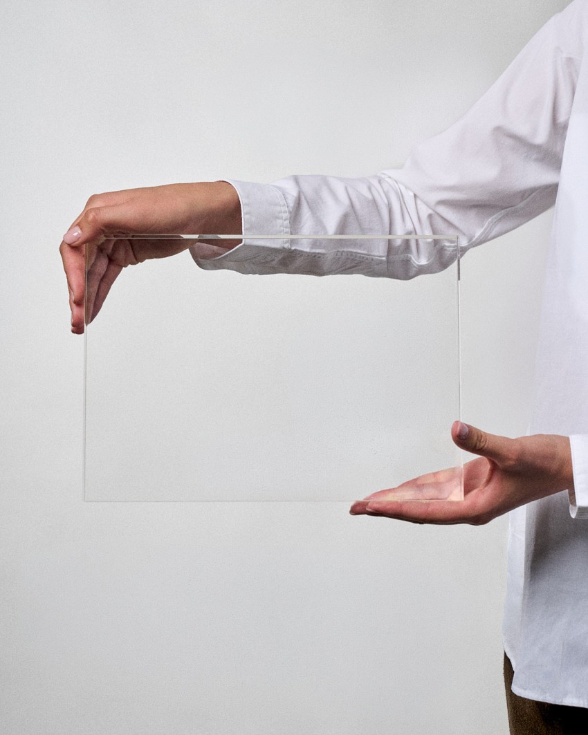 Acrylic Award plaque ready to personalize, held by a model, Sustain Awards