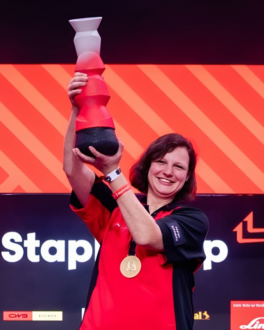 Custom trophy StaplerCup, 2026 – grey-to-red gradient on a recycled rubber base, made by Sustain Awards
