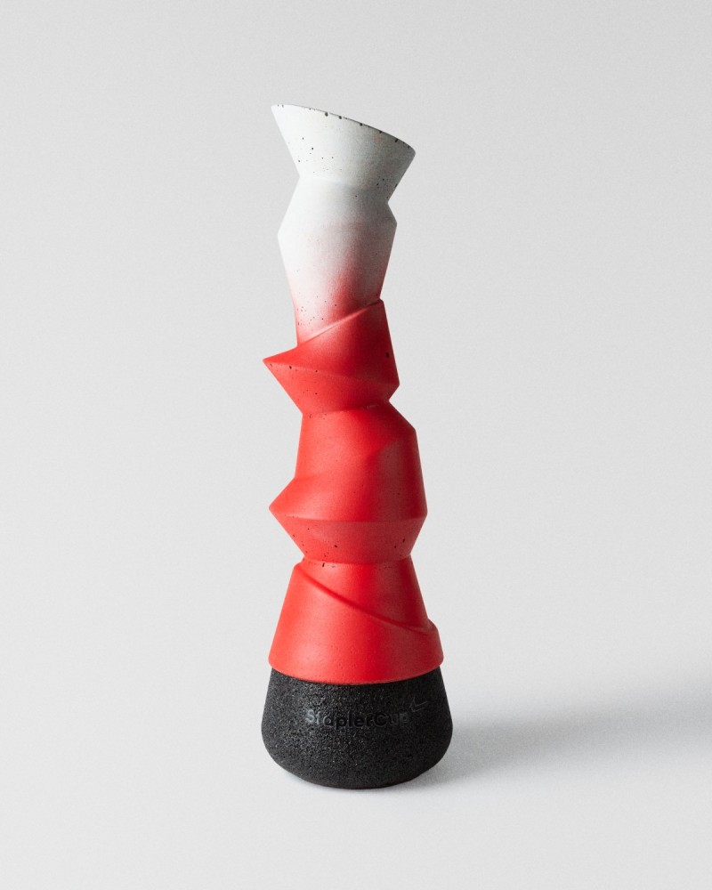 Custom StaplerCup 2026 trophy in concrete with recycled rubber, front view, made by Sustain Awards